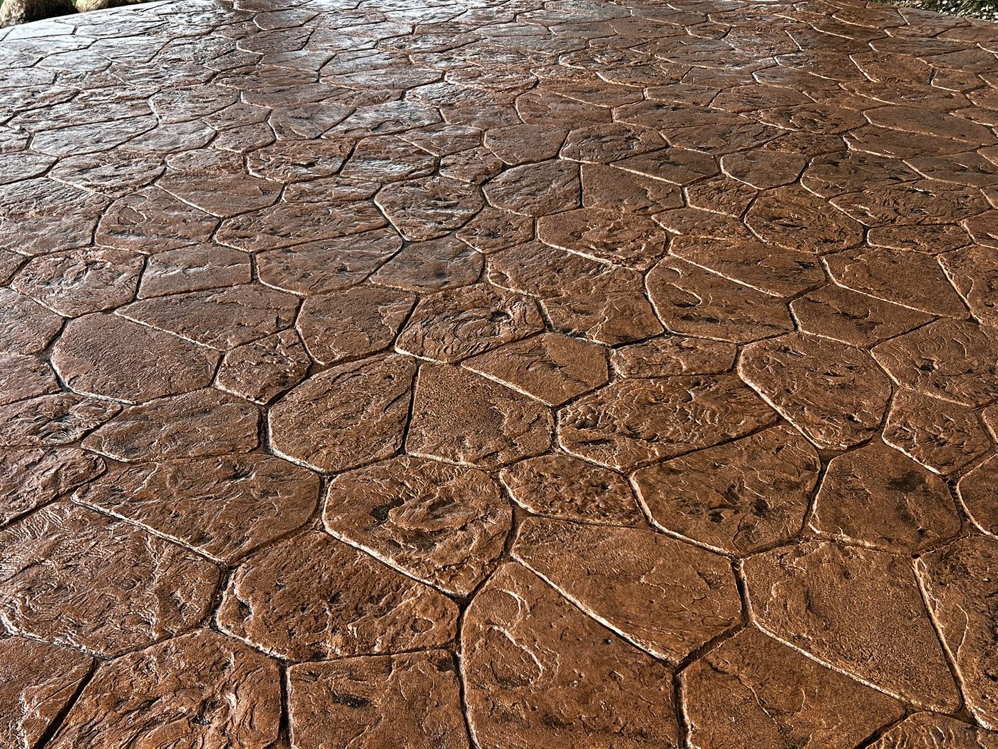 Close-up of stamped concrete with a natural stone texture